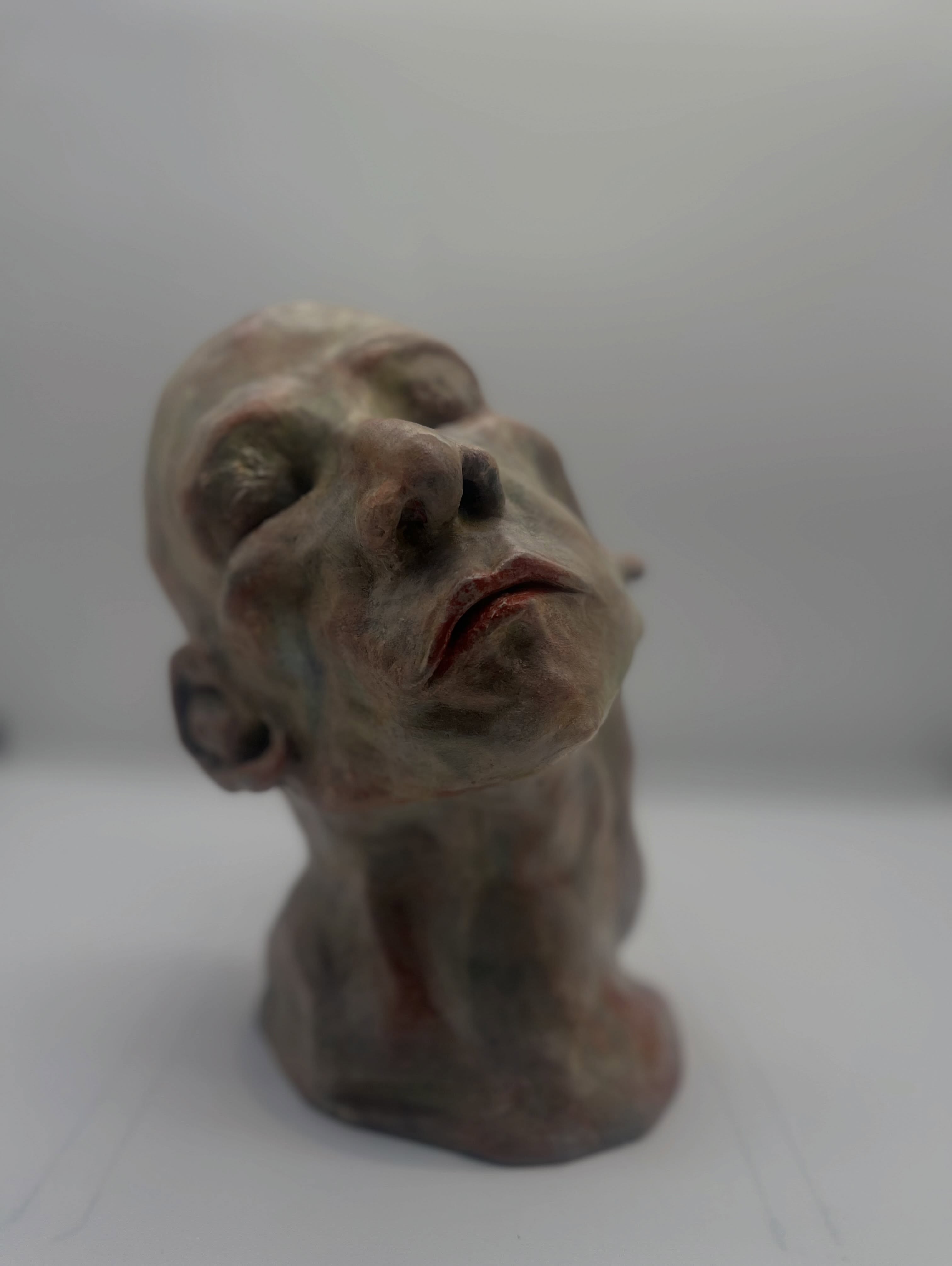 Head 001, a small mixed-media sculpture by Ilse Donders